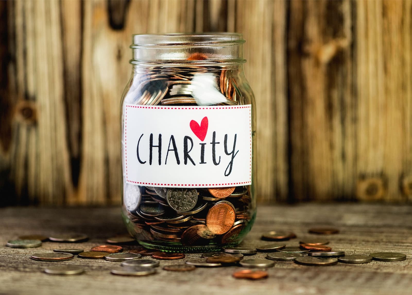 A charity jar with coins